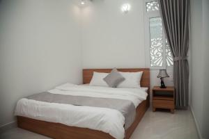 Postel nebo postele na pokoji v ubytování ALEX HOTEL Peony