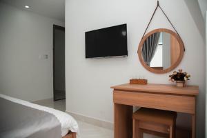 TV a/nebo společenská místnost v ubytování ALEX HOTEL Peony