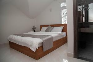 Postel nebo postele na pokoji v ubytování ALEX HOTEL Peony