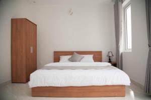 Postel nebo postele na pokoji v ubytování ALEX HOTEL Peony