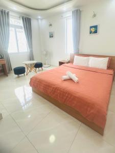 Postel nebo postele na pokoji v ubytování ALEX HOTEL Peony