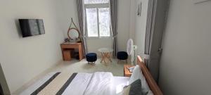 Postel nebo postele na pokoji v ubytování ALEX HOTEL Peony