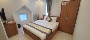 Postel nebo postele na pokoji v ubytování ALEX HOTEL Peony