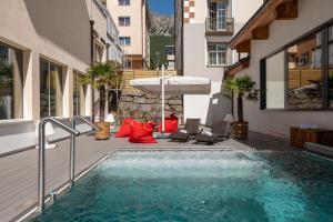 Bazén v ubytování Hotel Schweizerhof Lenzerheide nebo v jeho okolí