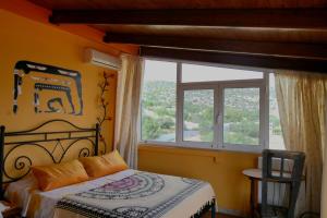Postel nebo postele na pokoji v ubytování Casa di Luce