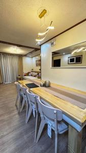 a conference room with a long table and chairs at WPY Condotel in Baguio