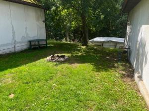 Aed väljaspool majutusasutust Kemp a Loděnice Podolsko - Chatka pro 2 osoby