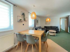 Posezení v ubytování Bungalows am Buchenkampweg