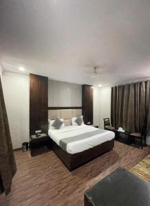 Postel nebo postele na pokoji v ubytování Hotel Radiance