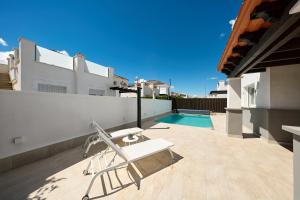 Bazén v ubytování Casa del Sol La Torre Golf Resort nebo v jeho okolí