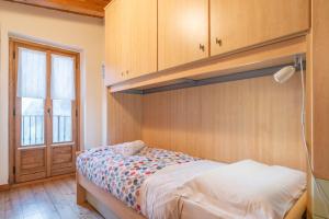Postel nebo postele na pokoji v ubytování La Dimora del Borgo