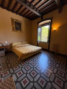Postel nebo postele na pokoji v ubytování Agriturismo Montecorona