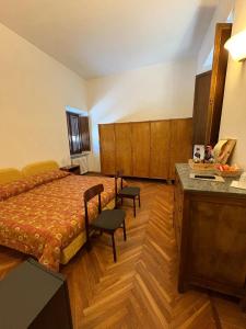 Postel nebo postele na pokoji v ubytování Agriturismo Montecorona