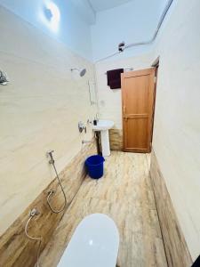 Phòng tắm tại Archana Guest House