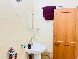 Phòng tắm tại Archana Guest House