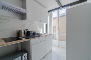 Kuchyň nebo kuchyňský kout v ubytování Comfortable Studio Apartments Crocetta - Turin
