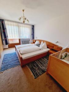 Posteľ alebo postele v izbe v ubytovaní Haus Rätikon