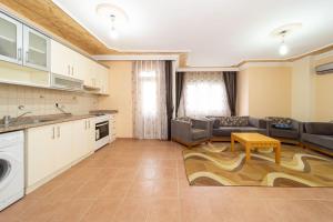 Kuchyň nebo kuchyňský kout v ubytování Sevgi Tatil Sitesi