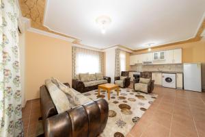 Kuchyň nebo kuchyňský kout v ubytování Sevgi Tatil Sitesi