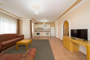 Kuchyň nebo kuchyňský kout v ubytování Sevgi Tatil Sitesi