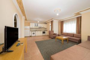 Kuchyň nebo kuchyňský kout v ubytování Sevgi Tatil Sitesi