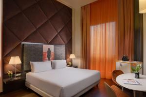 A bed or beds in a room at Nhow Milan
