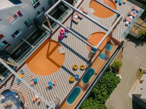 an overhead view of a playground in a building at Nhow Milan in Milan