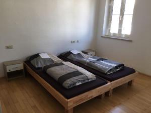 Postel nebo postele na pokoji v ubytování zum Handwerker Glück Boschhorn