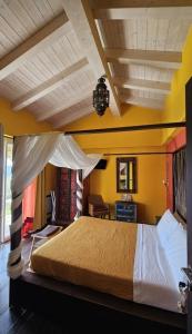 A bed or beds in a room at La cicala stonata