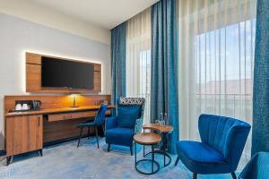 TV a/nebo společenská místnost v ubytování Hotel Diament Plaza Katowice