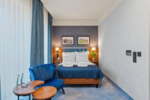 Postel nebo postele na pokoji v ubytování Hotel Diament Plaza Katowice