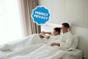 Postel nebo postele na pokoji v ubytování Apartments by Mara Holiday