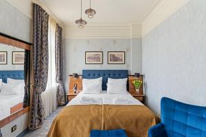 Postel nebo postele na pokoji v ubytování Hotel Diament Plaza Katowice