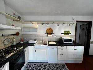 Kuchyň nebo kuchyňský kout v ubytování Casale Gelsomino