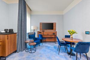 TV a/nebo společenská místnost v ubytování Hotel Diament Plaza Katowice