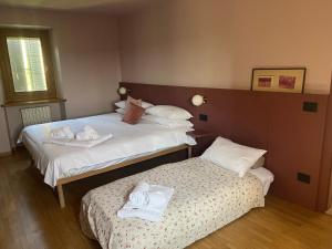 Postel nebo postele na pokoji v ubytování Bubamara - Bed and Breakfast
