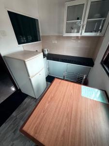 Kuchyň nebo kuchyňský kout v ubytování Home Living Unit