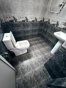 Koupelna v ubytování Home Living Unit