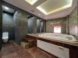 Koupelna v ubytování 第八月台九號行館No9 Hotel + 15 fotografií