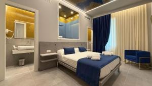 Postel nebo postele na pokoji v ubytování Shanti Rooms & Apartments Lucullo