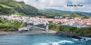a small town on the shore of a beach at BoaVista House 2 in Maia