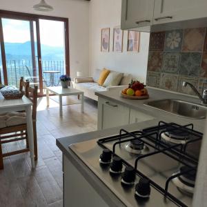 Dapur atau dapur kecil di WindwoW - Your flat in Baunei