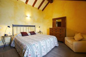 Letto o letti in una camera di Rustico alla Spiaggia