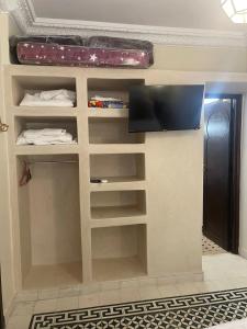 Maison confortable avec vue sur Oujda - 70 m²_222的电视和/或娱乐中心