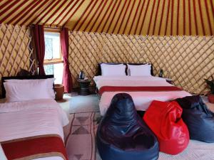Letto o letti in una camera di Shivapuri Heights Cottage
