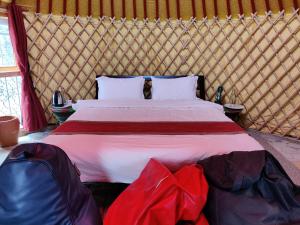 Letto o letti in una camera di Shivapuri Heights Cottage