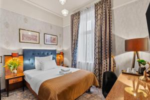 Postel nebo postele na pokoji v ubytování Hotel Diament Plaza Katowice