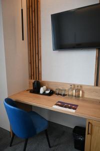 TV a/nebo společenská místnost v ubytování Hotel Centrum Malbork