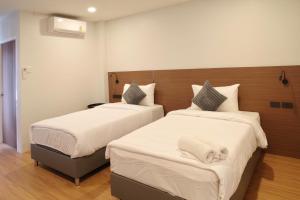 NOW’S HOSTEL房間的床
