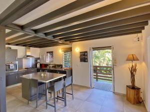 Η κουζίνα ή μικρή κουζίνα στο Villa Etoile du lagon